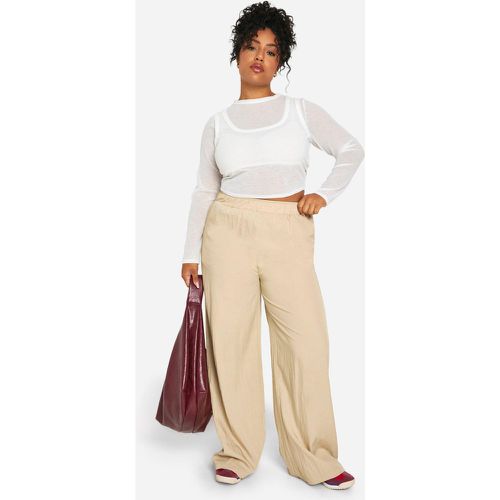 Pantaloni Plus Size a gamba ampia in nylon - boohoo - Modalova