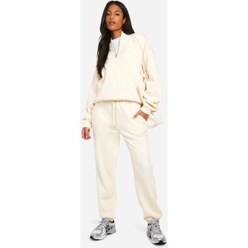 Tuta sportiva Tall con zip corta e cuciture - boohoo - Modalova