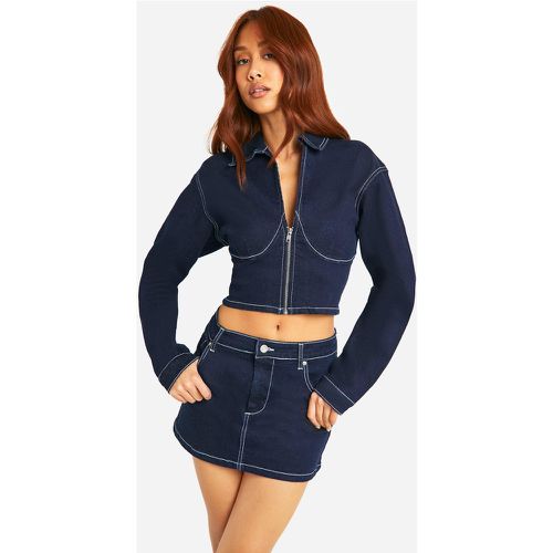 Minigonna ridotta in denim indaco grezzo con cuciture a contrasto - boohoo - Modalova