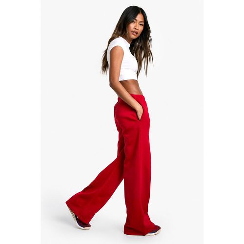 Pantaloni tuta dritti minimali con laccetti a vita media - boohoo - Modalova