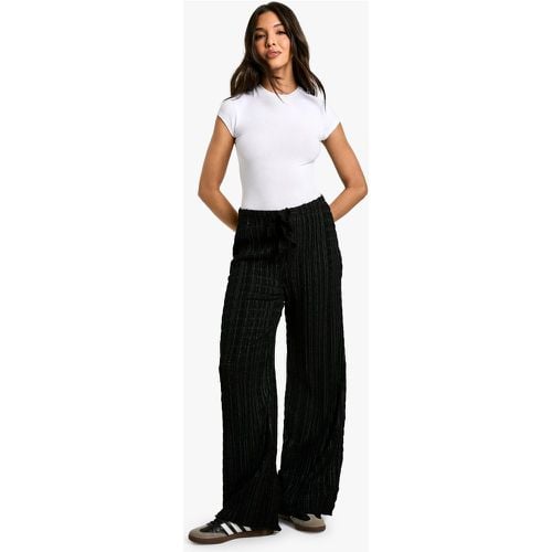 Pantaloni in maglia effetto goffrato con laccetti - boohoo - Modalova