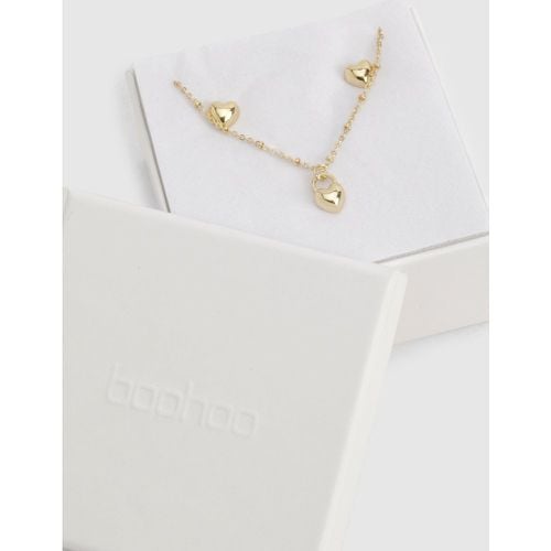 Set regalo con orecchini a cuore e collana placcati in oro - boohoo - Modalova