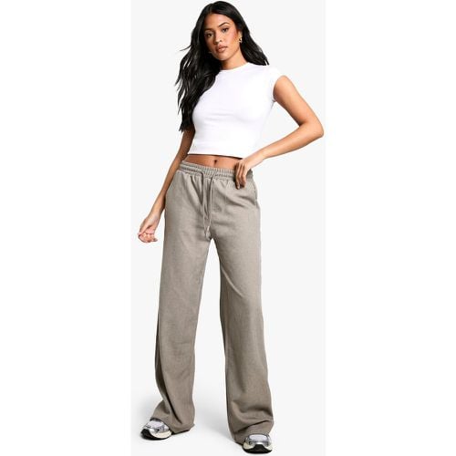 Pantaloni sartoriali Tall a gamba ampia con laccetti in vita - boohoo - Modalova