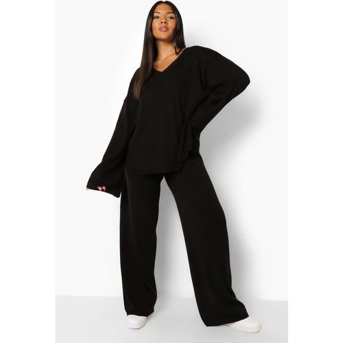 Set Plus Size top con scollo a V & pantaloni con spacco - boohoo - Modalova