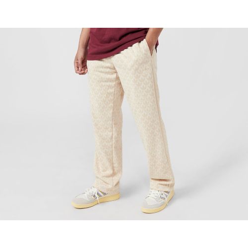 Pantalón Graphics Monogram - adidas Originals - Modalova