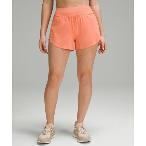 – Fast and Free Shorts im Classic Fit und mit reflektierenden Details und hohem Bund für Frauen – 8 cm – Orange – Größe 14 - lululemon - Modalova