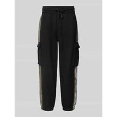 Tapered Fit Sweatpants mit Cargotaschen Modell 'ATHLETIC MIX' - EA7 Emporio Armani - Modalova