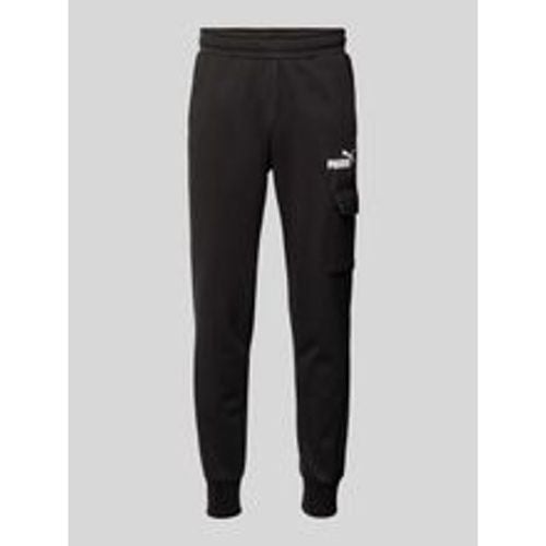 Slim Fit Sweatpants mit Cargotasche - Puma - Modalova