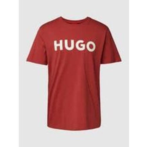 T-Shirt mit Motiv-Print und Logo-Print sowie Regular Fit - HUGO - Modalova