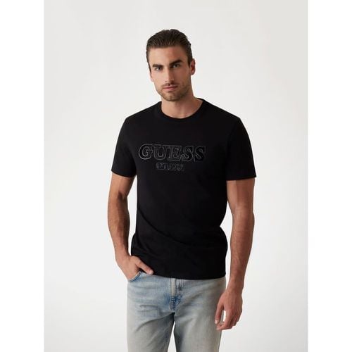 T-Shirt Con Logo Floccato - Guess - Modalova