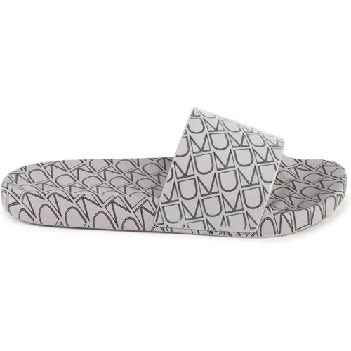 Sliders, female, , Size: 12 US Brown Monogram Pattern Slides - Calvin Klein - Modalova