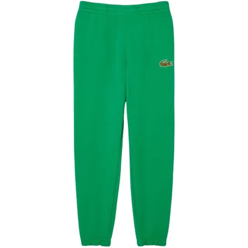 Grüne Sportliche Sweatpants Französischer Chic Stil , Herren, Größe: S - Lacoste - Modalova