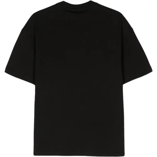 Schwarze T-Shirts und Polos - Calvin Klein - Modalova
