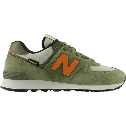 Grüne Sneakers Stylische Sportschuhe , Herren, Größe: 41 1/2 EU - New Balance - Modalova