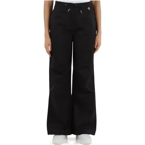 Weite Hose aus technischem Stoff - Calvin Klein Jeans - Modalova