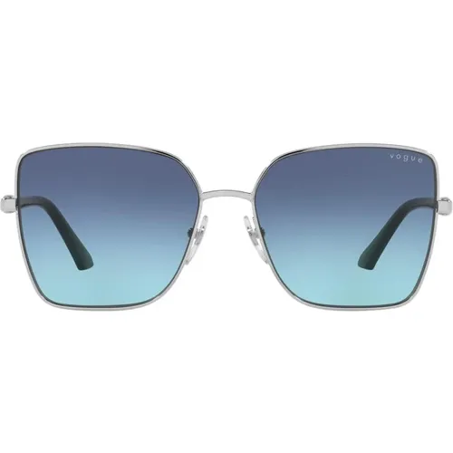 Silber/Blau Getönte Sonnenbrille , Damen, Größe: 58 MM - Vogue - Modalova