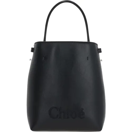 Schwarze Lederhandtasche - Ikonische Eleganz,Schwarze Leder-Schultertasche Runde Griffe - Chloé - Modalova