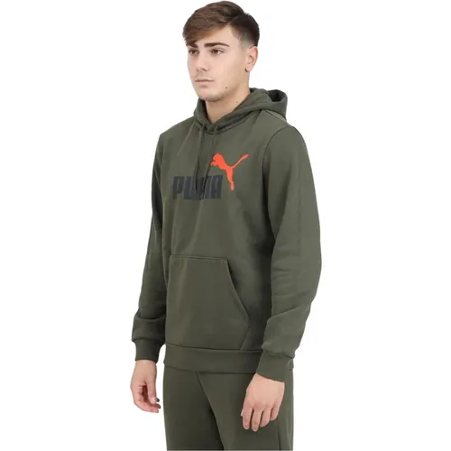 Grüner Hoodie Essentials+ Two-Tone Big Logo , Herren, Größe: XS - Puma - Modalova