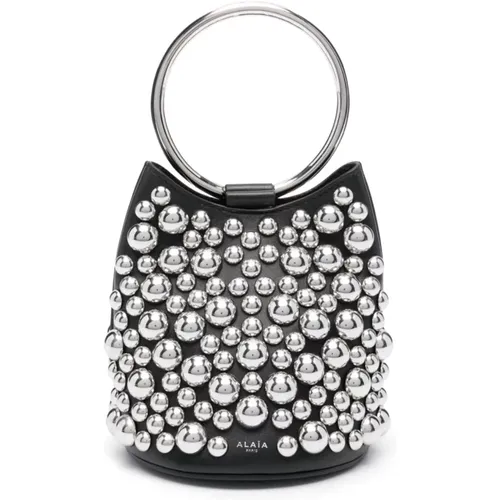 Handbags, female, , Size: ONE SIZE Studded Bucket Bag in Leather - Alaïa - Modalova