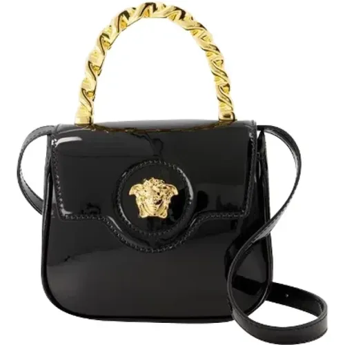 Leather handbags , female, Sizes: ONE SIZE - Versace - Modalova