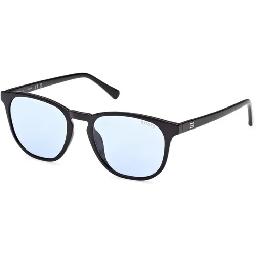 Elegant and Refined Round Sunglasses with Light Blue Lenses , unisex, Sizes: 53 MM - Guess - Modalova