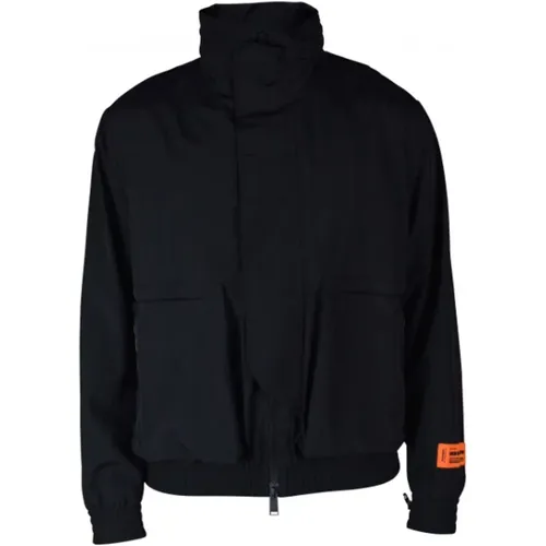 Schwarze Jacke mit Kapuze und Logo-Print - Heron Preston - Modalova