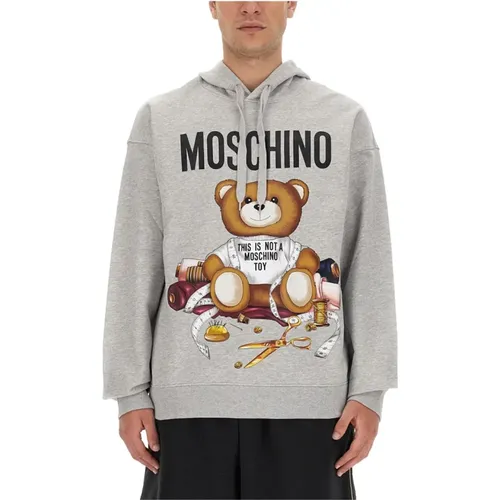 Print-Sweatshirt mit Kordelzugkapuze - Moschino - Modalova