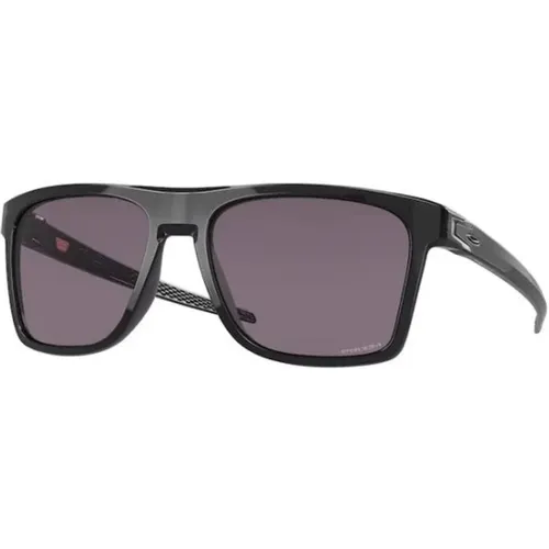 Schwarze Stilvolle Sonnenbrille für Trendigen Look , unisex, Größe: 57 MM - Oakley - Modalova