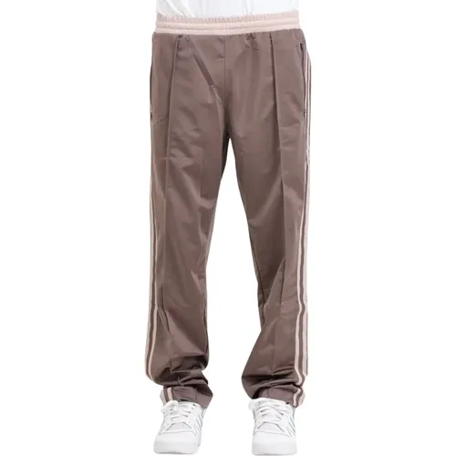 Braune Track Pants mit Reißverschlusstaschen , Herren, Größe: XL - adidas Originals - Modalova