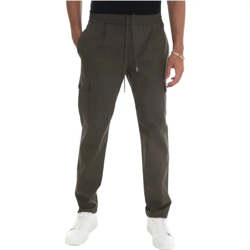 Slim-cut trousers , male, Sizes: W30, W34, W36, W33, W32 - Tommy Hilfiger - Modalova