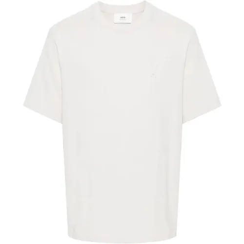 Weißes T-Shirt aus Bio-Baumwolle mit geprägtem Logo,T-Shirts - Ami Paris - Modalova