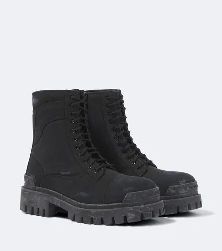 Botas con cordones Combat Strike de lona - Balenciaga - Modalova