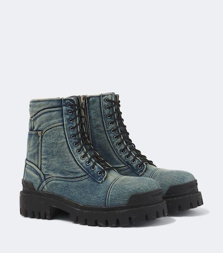 Combat Strike denim lace-up boots - Balenciaga - Modalova