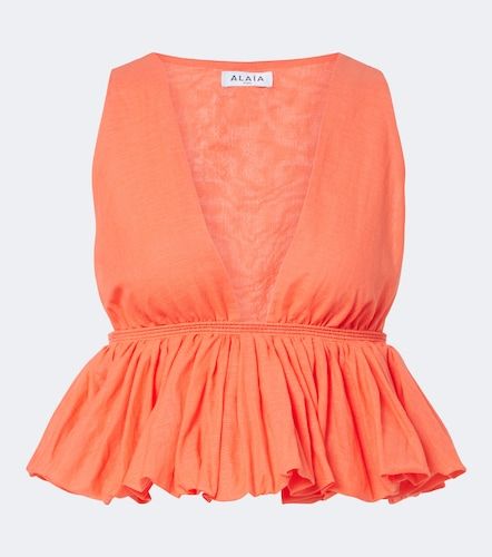 Alaïa Top Peplum in cotone e lino a righe - Alaia - Modalova