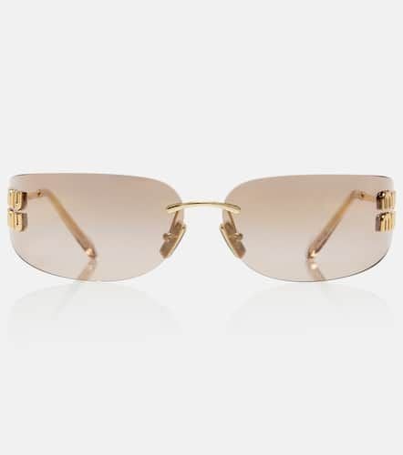 Miu Miu Logo oval sunglasses - Miu Miu - Modalova