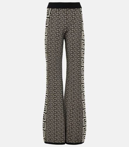 Monogram flared wool-blend pants - Balmain - Modalova