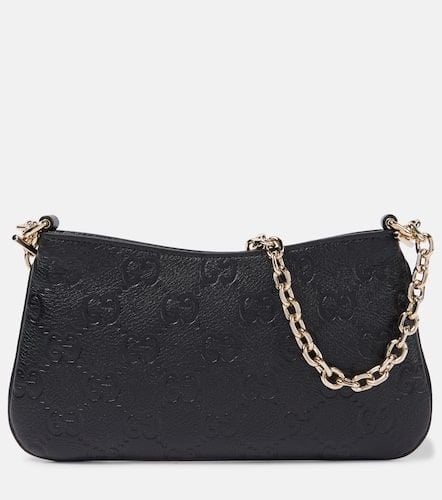 GG Super Mini debossed leather shoulder bag - Gucci - Modalova