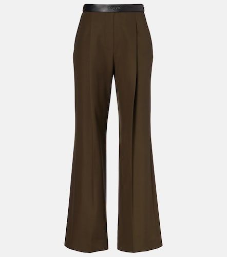 Pantaloni flared in lana con pelle - Loewe - Modalova