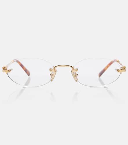 Miu Miu Oval logo glasses - Miu Miu - Modalova