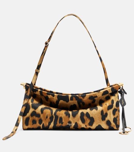 Le Click East West Medium shoulder bag - Alaia - Modalova