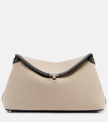 T-Lock leather-trimmed canvas clutch - Toteme - Modalova