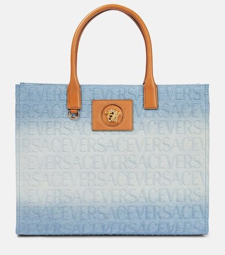 Versace Large logo denim tote bag - Versace - Modalova