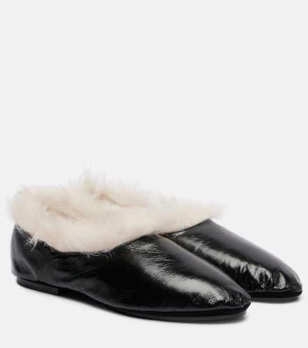 Slip-on in pelle con shearling - Jil Sander - Modalova