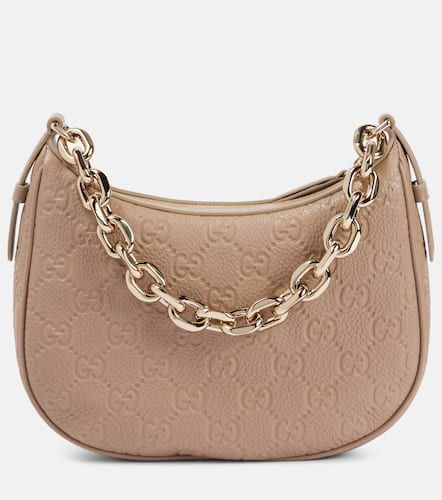 GG Emblem Small leather shoulder bag - Gucci - Modalova