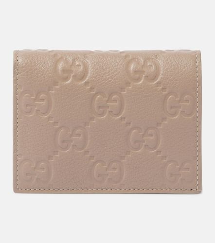 GG Mini debossed leather wallet - Gucci - Modalova