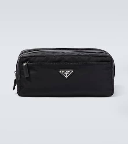 Re-Nylon leather-trimmed travel bag - Prada - Modalova