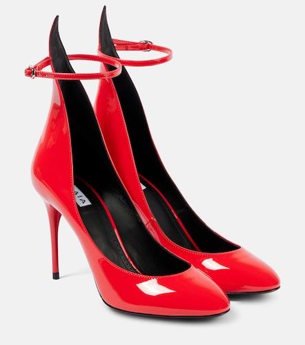 Decollete patent leather pumps - Alaia - Modalova