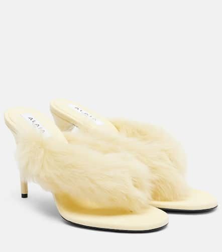AlaÃ¯a Shearling and leather thong sandals - Alaia - Modalova