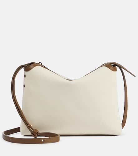 Lina leather-trimmed canvas crossbody bag - Khaite - Modalova