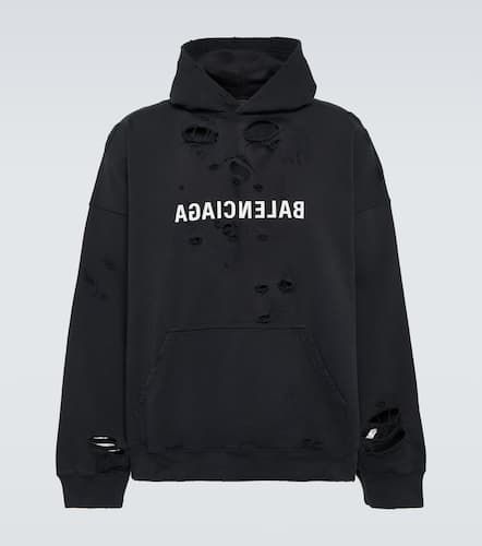 Destroyed logo cotton jersey hoodie - Balenciaga - Modalova